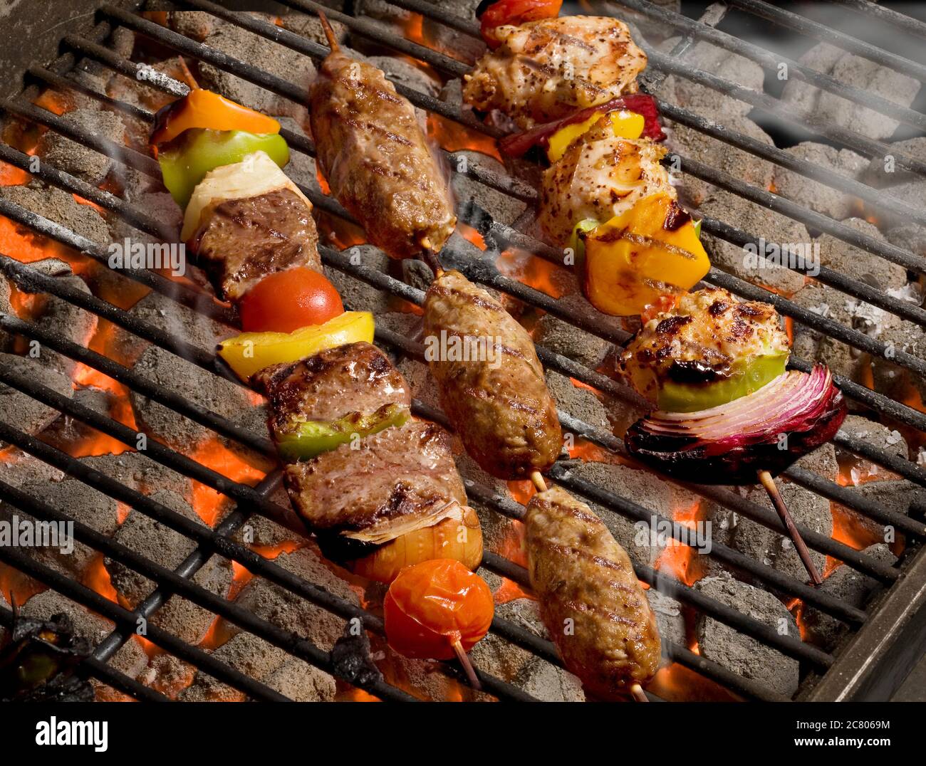 grilling Shish Kebab on open grill Stock Photo Alamy