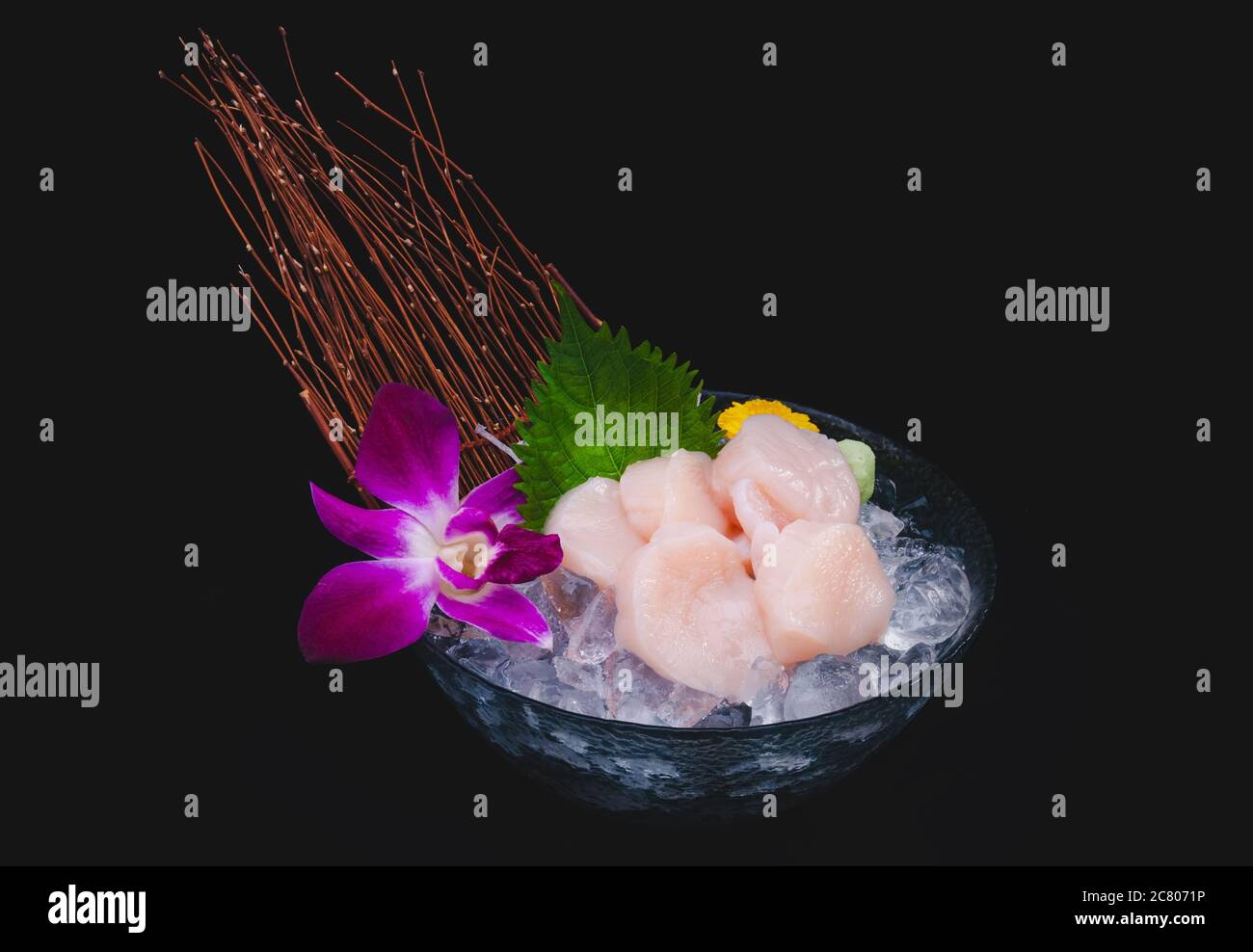 Japanese scallop meats Hotate sashimi set in cup on ice with black background Stock Photo Alamy