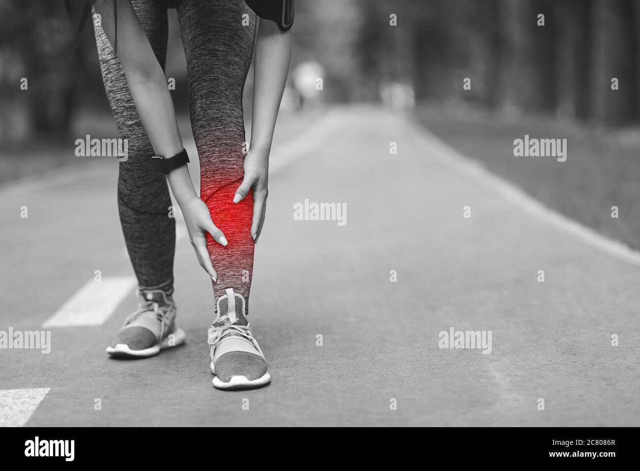 Shin Splints Injury. Female Athlete Massaging Injured Leg, Suffering