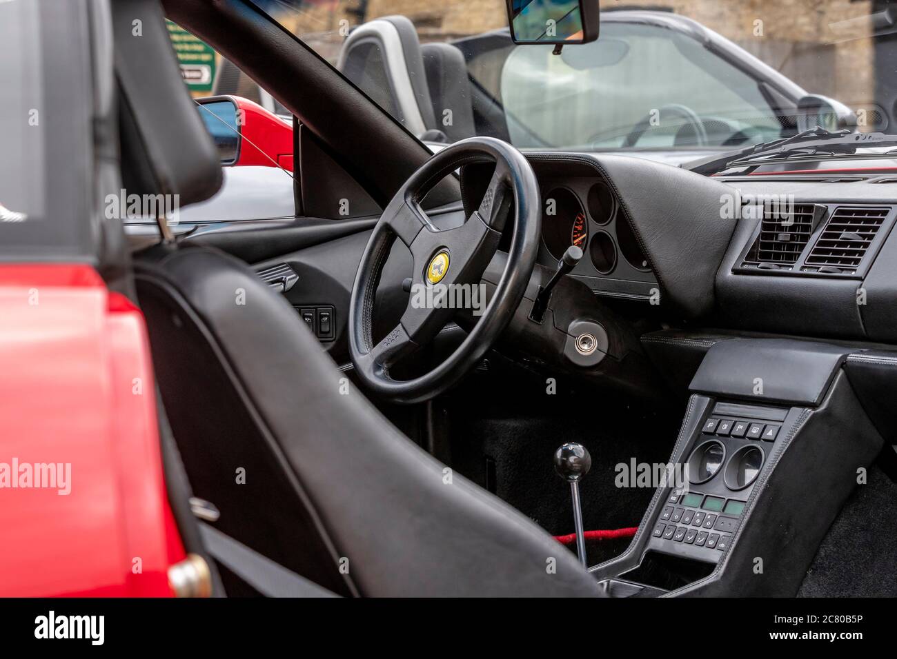 Ferrari 348 TB (Berlinetta) (1993) parked at The Rural Shopping Yard, Castle Ashby, Northampton, England, UK. Stock Photo