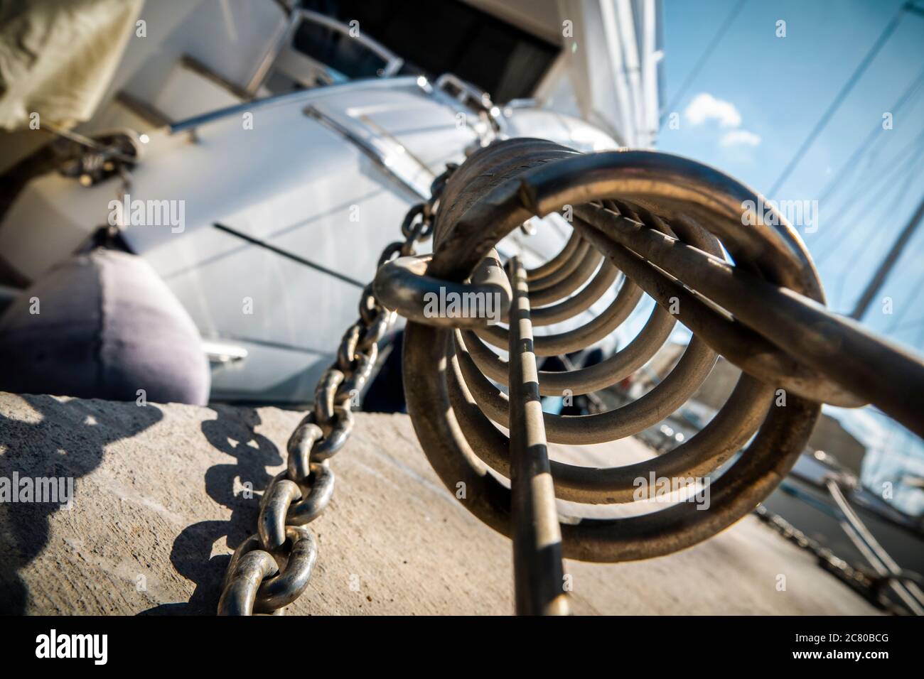 Metal mooring coil spring detail. Stock Photo