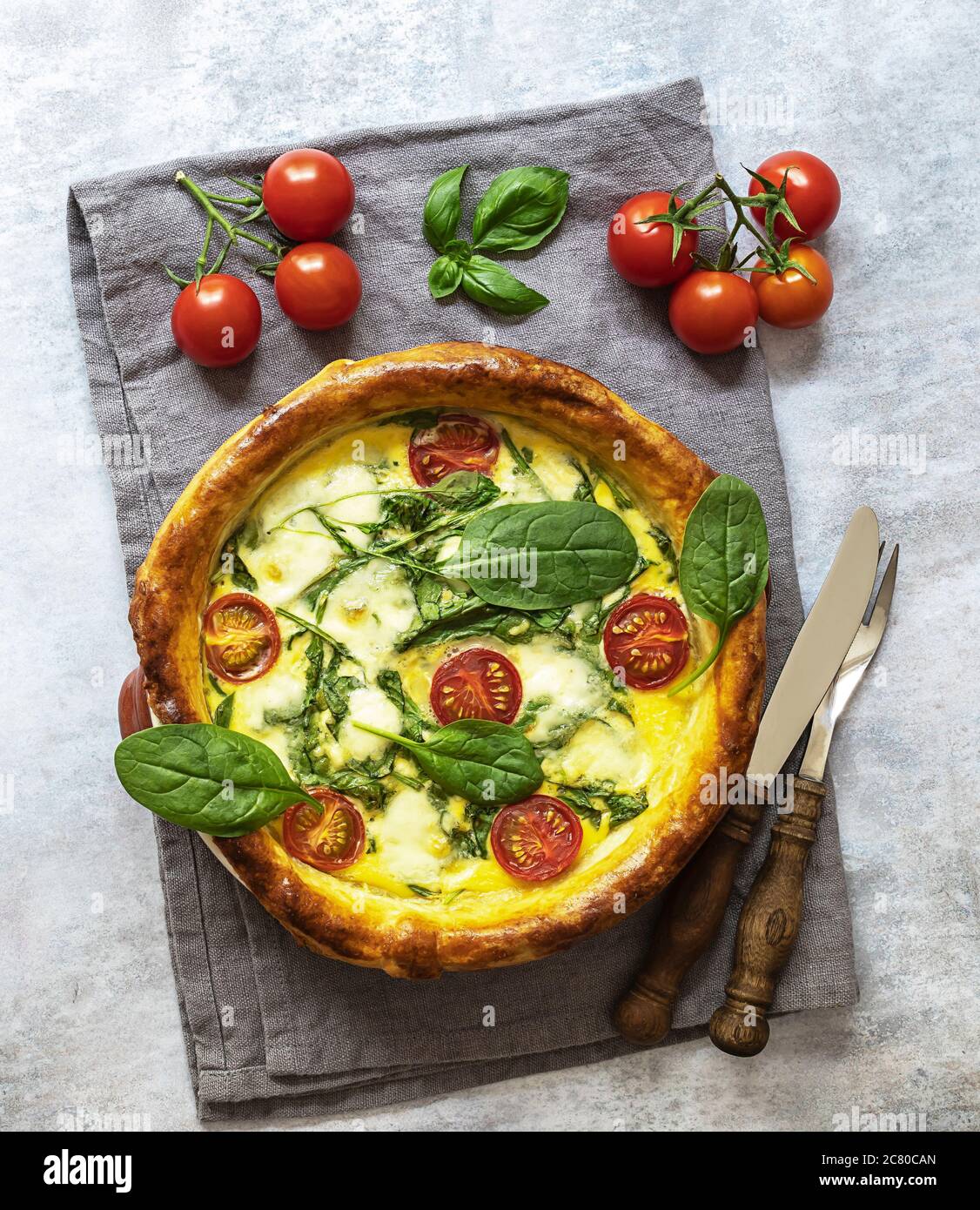 Vegetarian quiche with spinach, feta, and mozzarella cheese, and