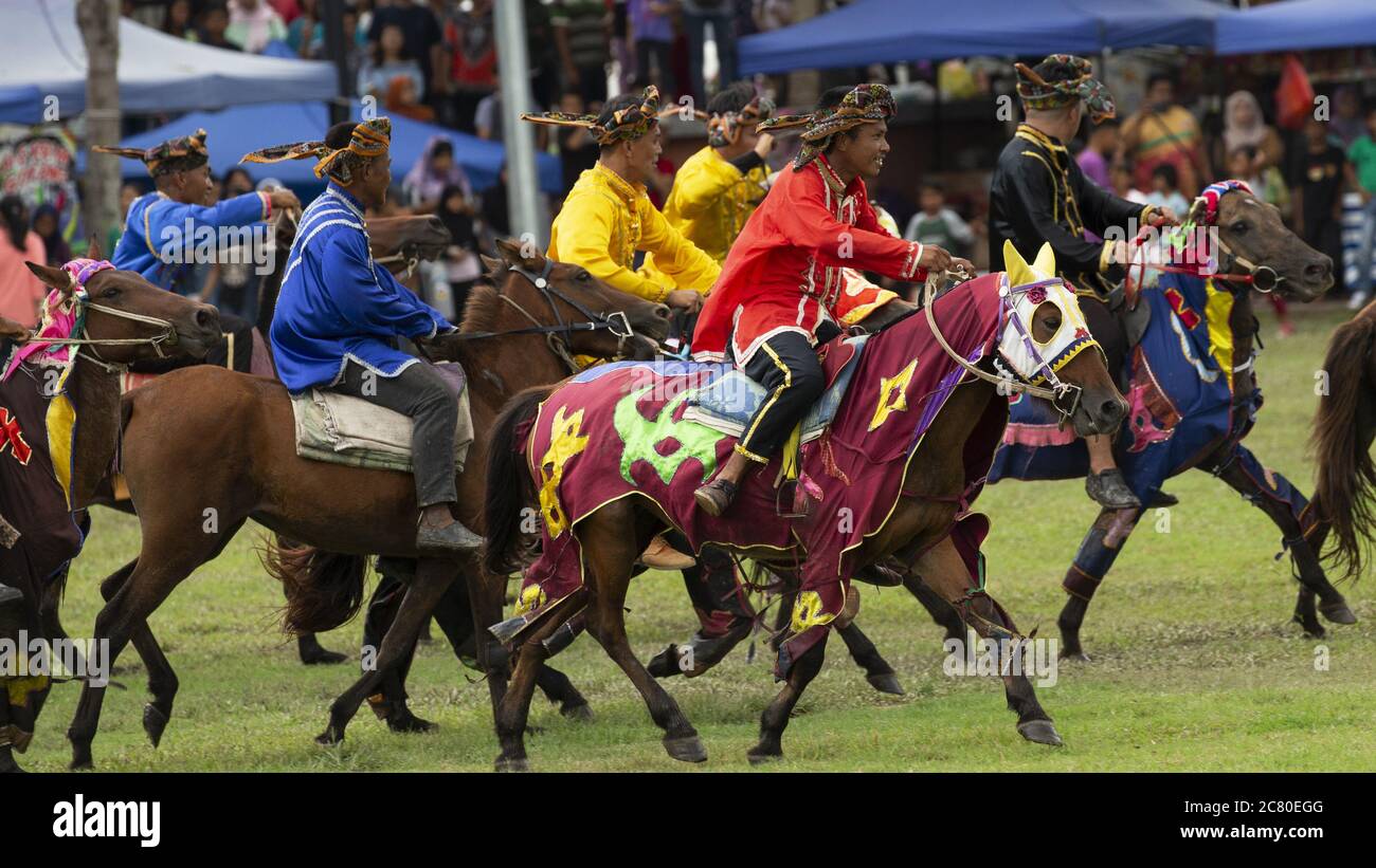 Tamu Besar festival Kota Belud Sabah Borneo Malaysia traditions Southeast Asia cowboys horse costume Stock Photo