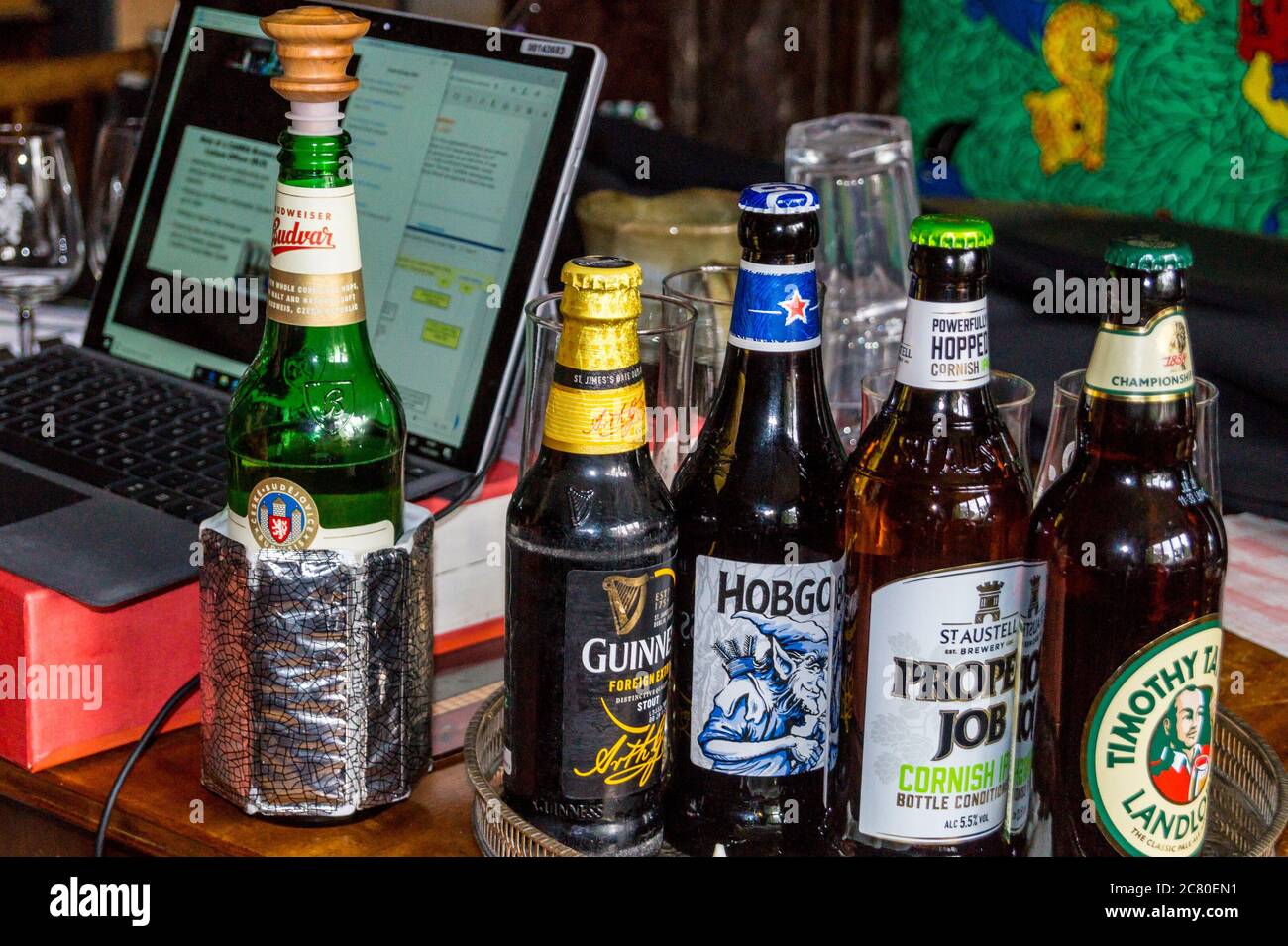 PHOTOGRAPH Bottles of beer on a dining table selected for an online CAMRA beer tasting event during Covid-19 pandemic Stock Photo