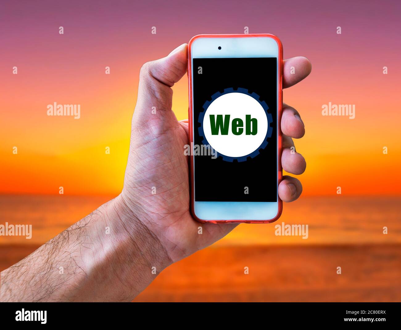 Web Marketing Concept Hand holding mobile phone Stock Photo - Alamy