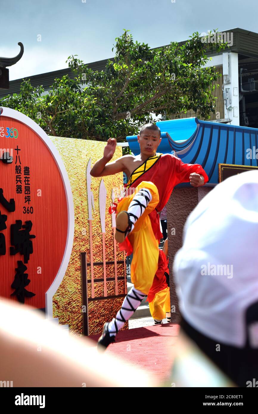 Shaolin Monks Performing Martial Arts at Ngong Ping Village on Lantau Island, Hong Kong Stock Photo