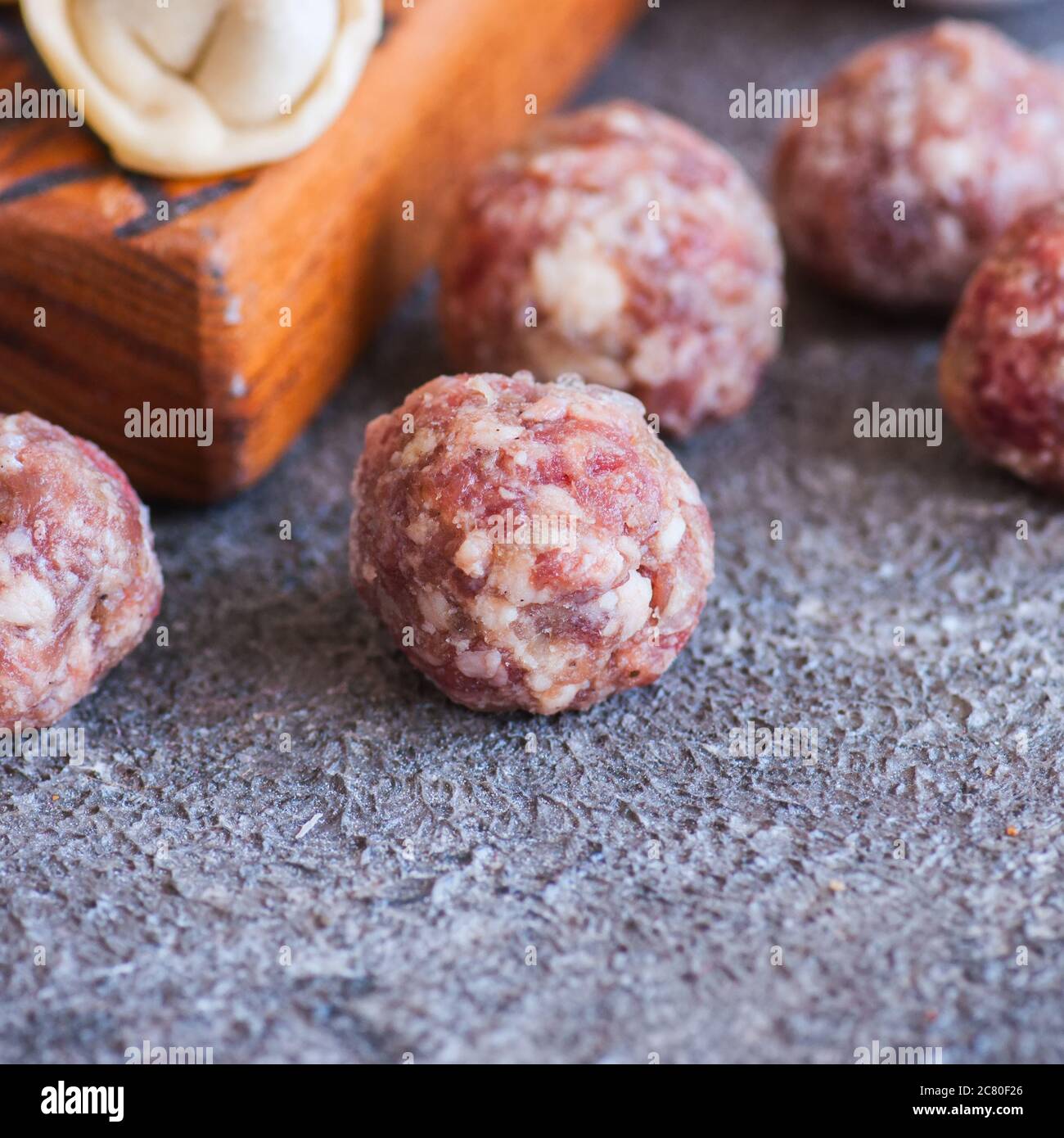 Raw homemade meatballs. Close up, frozen food concept. Stock Photo