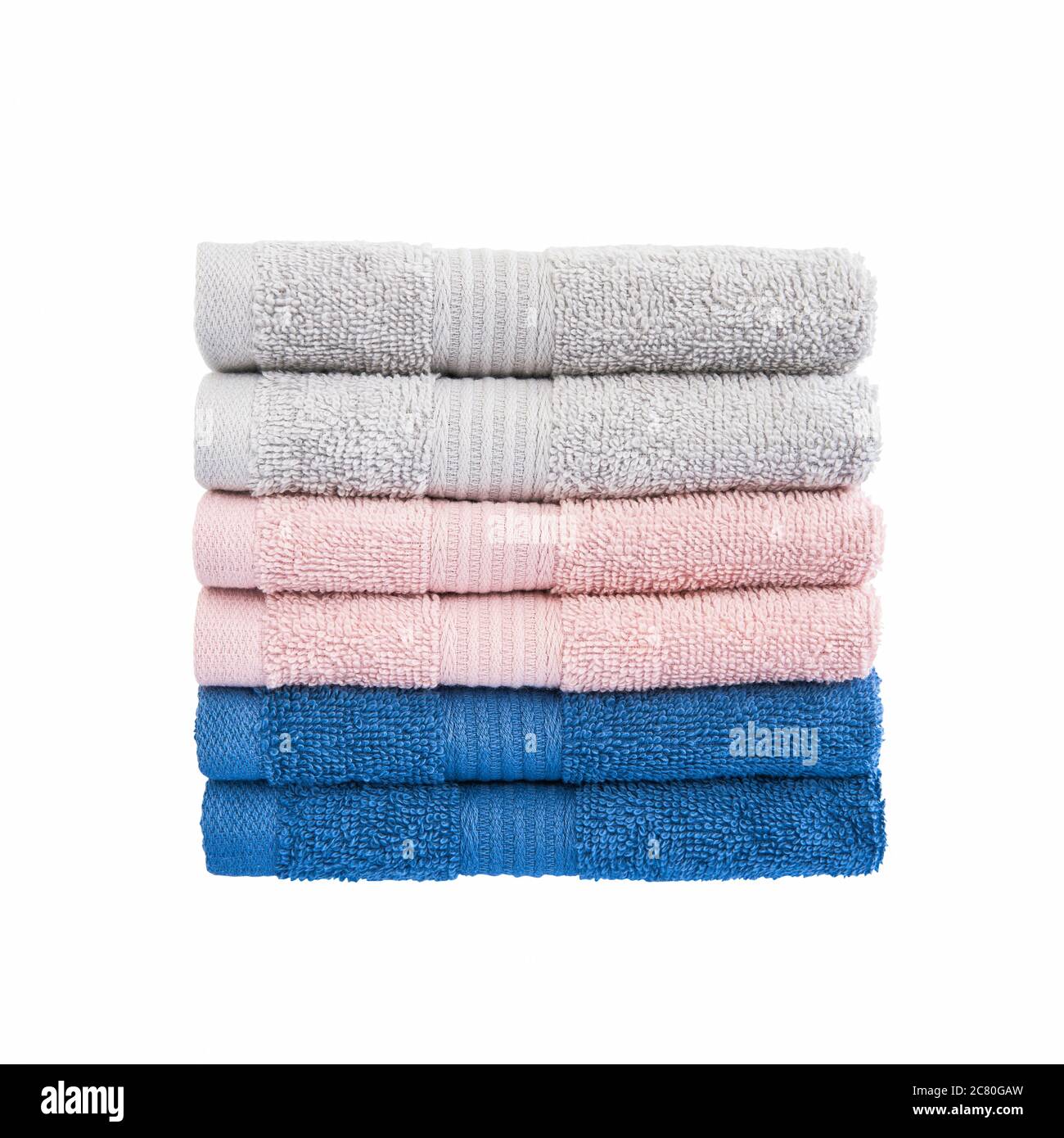 Colorful bath towels in stack isolated over white background with clipping path. Stock Photo