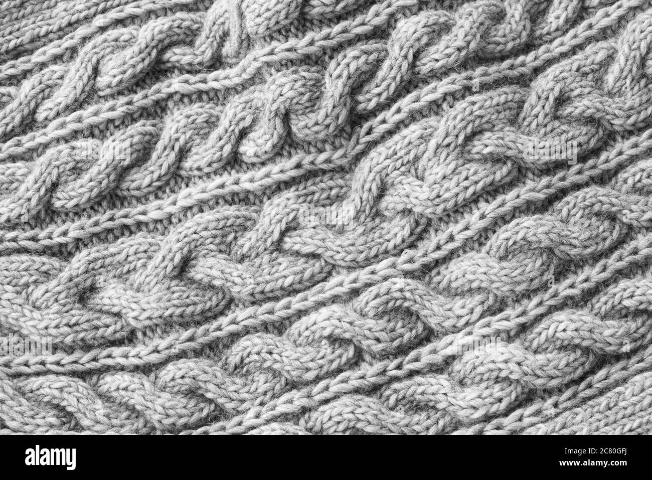 Gray knitted texture. Handmade Knitwear. Top view Stock Photo