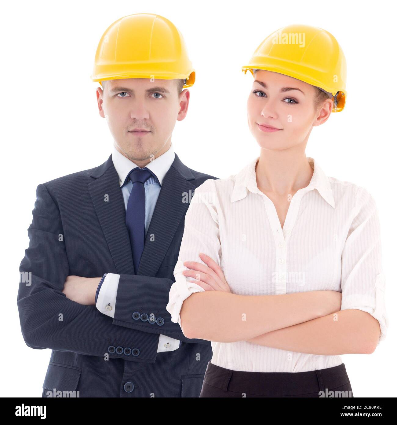 young man and woman in builder 's helmets isolated on white background ...