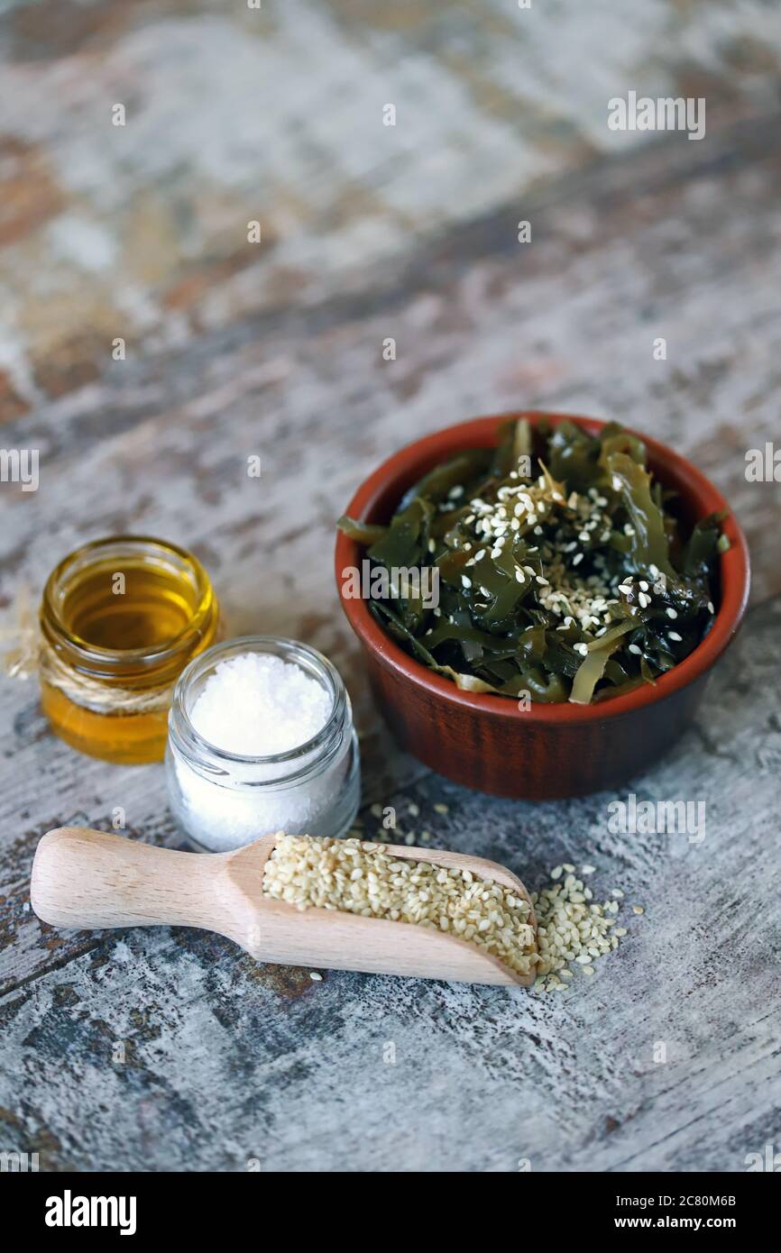 Sea kale with sesame seeds and olive oil. Healthy seafood. Omega 3