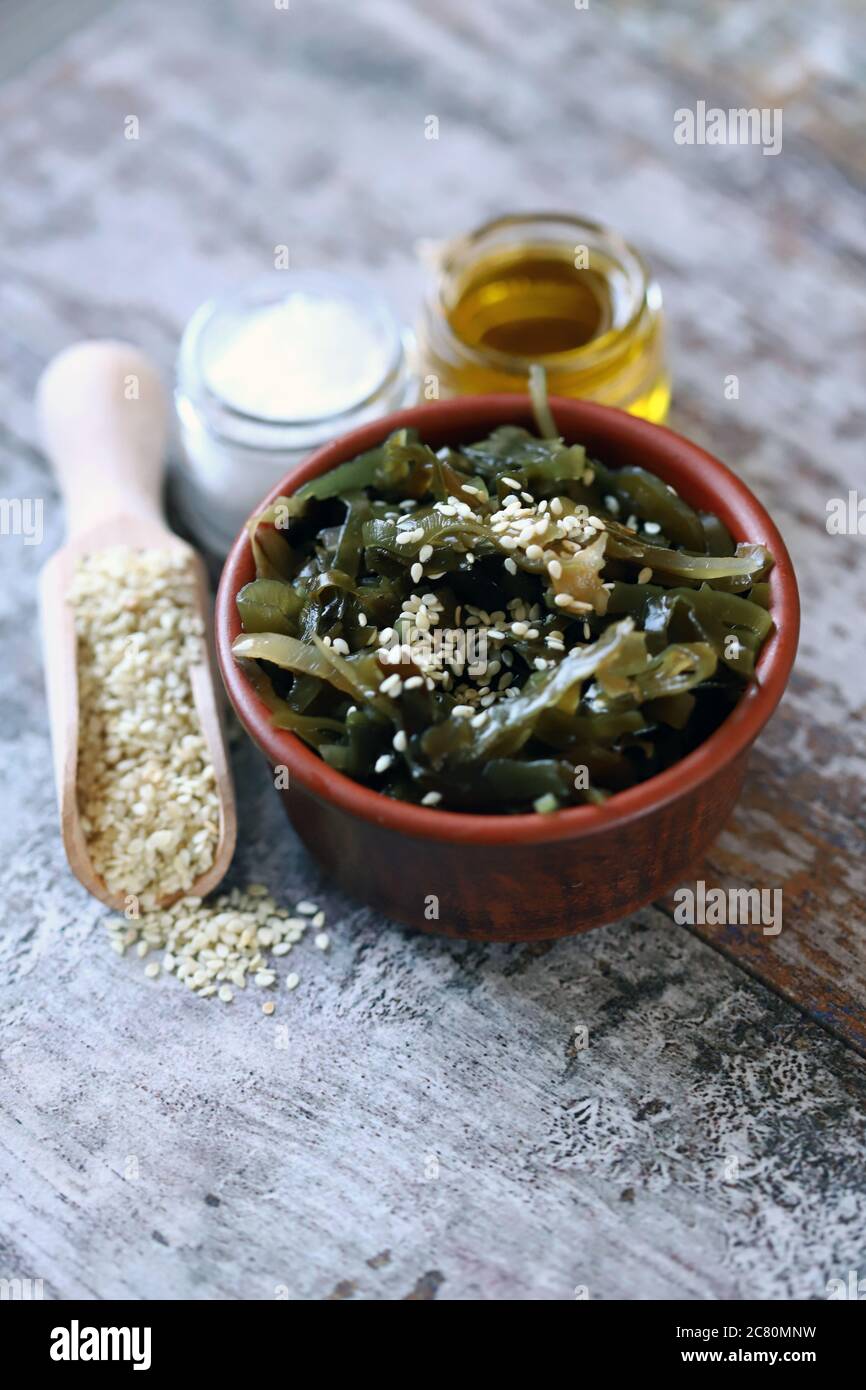 Sea kale with sesame seeds and olive oil. Healthy seafood. Omega 3