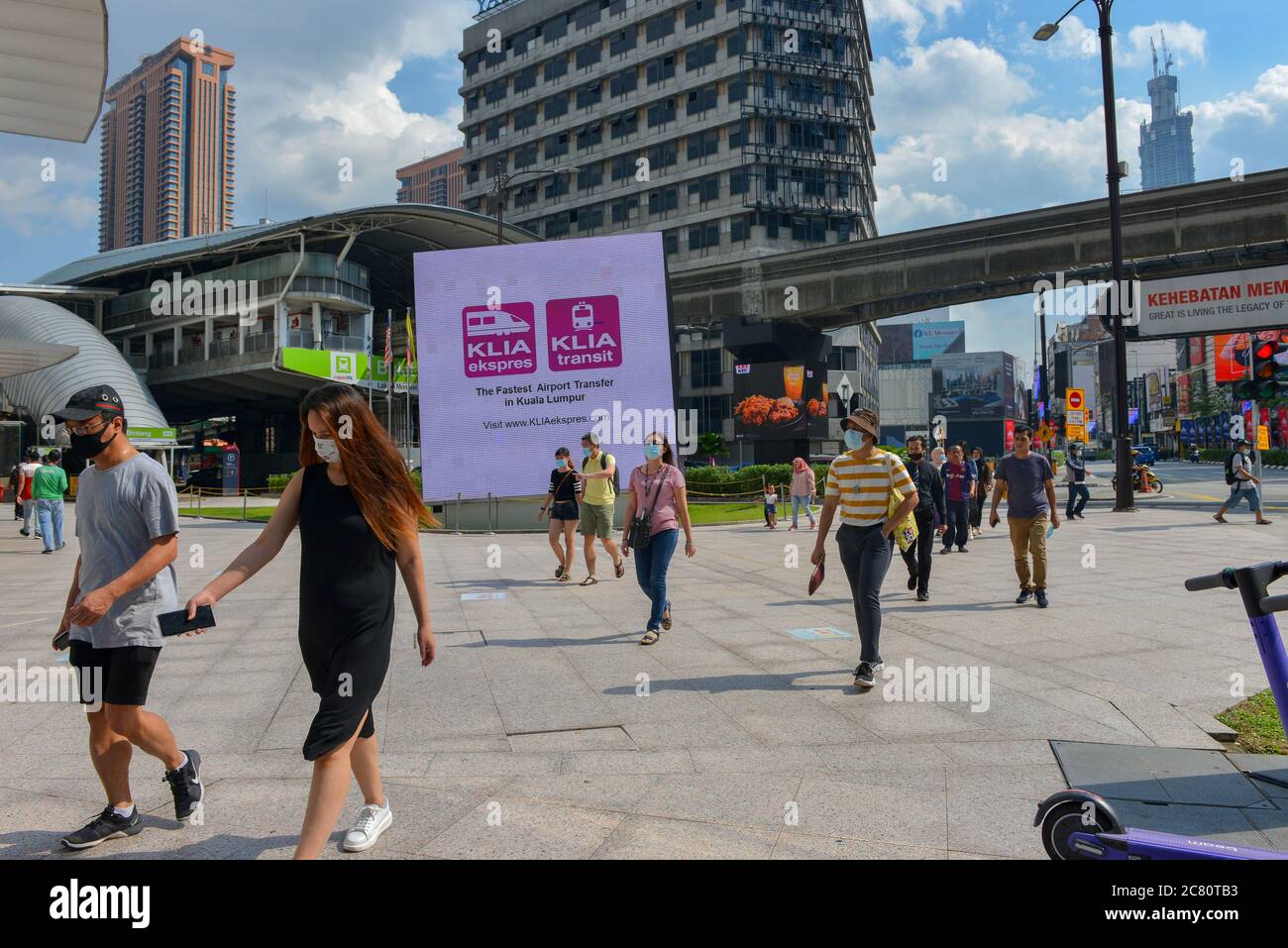 Kuala Lumpur Malaysia 20th July 2020 People Wearing Face Masks Walk On A Street In Kuala Lumpur Malaysia July 20 2020 Malaysian Prime Minister Muhyiddin Yassin Cautioned His Compatriots On Monday Against