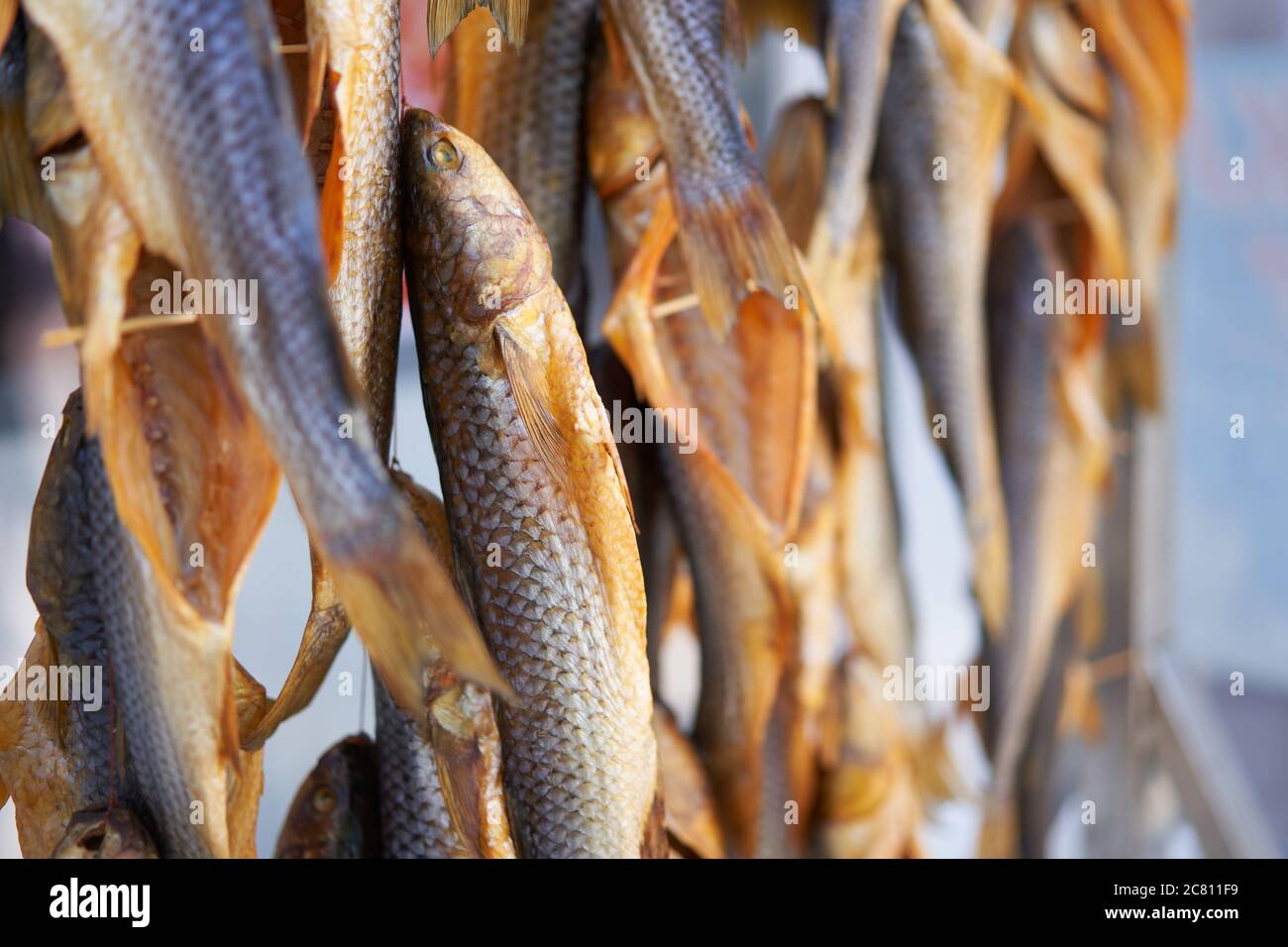 Dried fish hanging rope raw seafood drying salted beer snack Dry fish