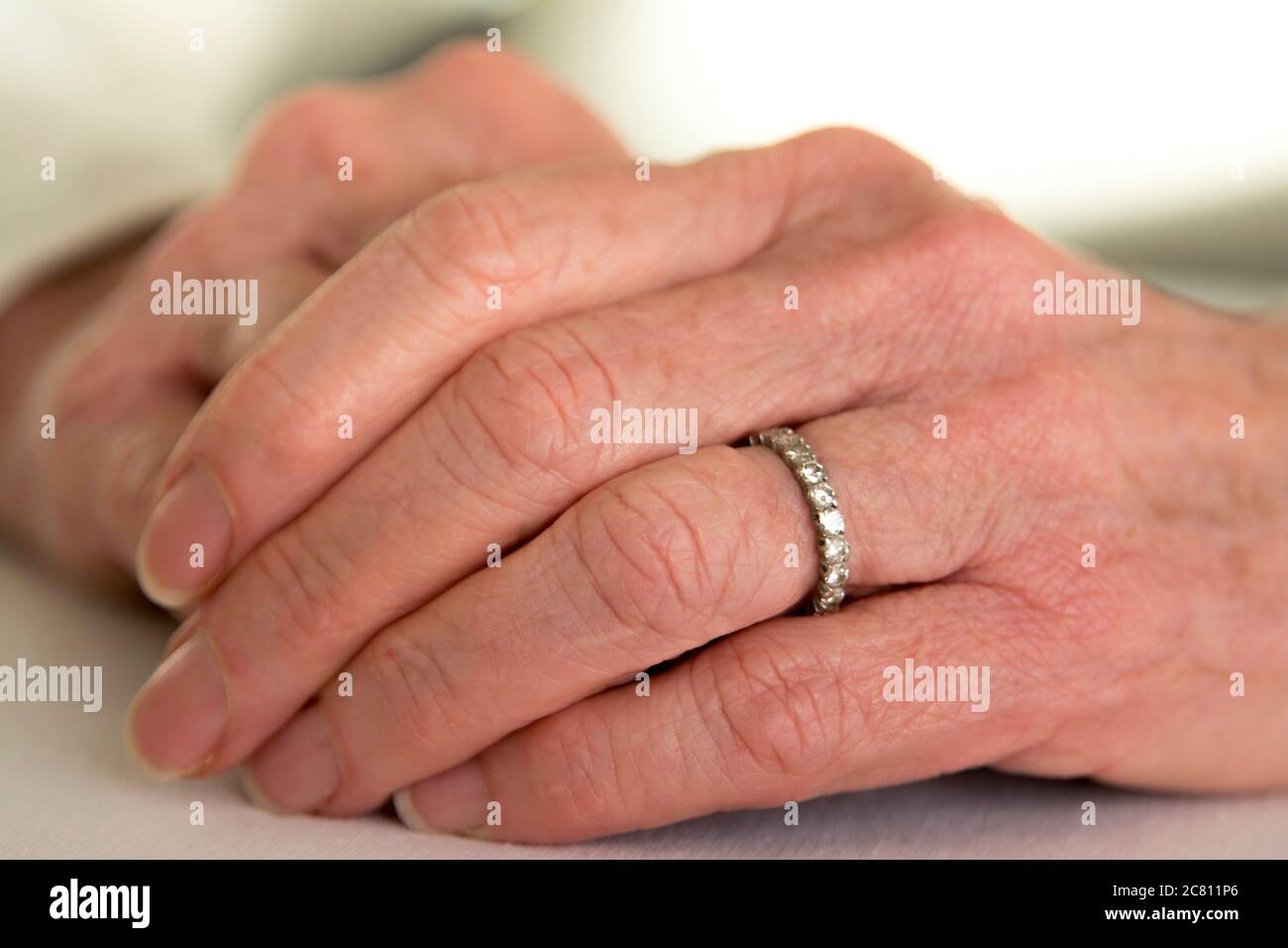 Wedding rings on hand Stock Photo