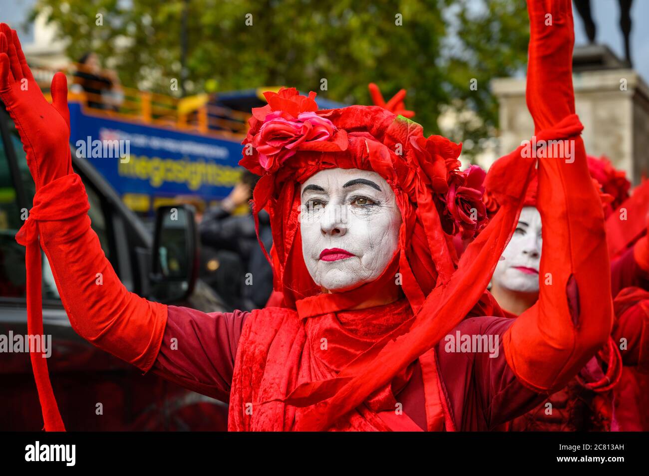 LONDON - OCTOBER 18, 2019: Close up of Red Brigade protesters at an Extinction Rebellion protest Stock Photo