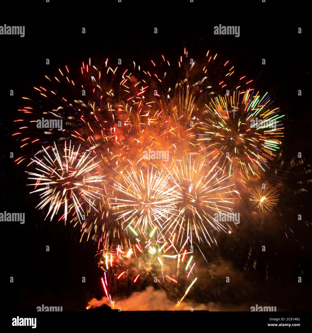 Fireworks illuminate the 14th of july, bastille day in France Stock Photo