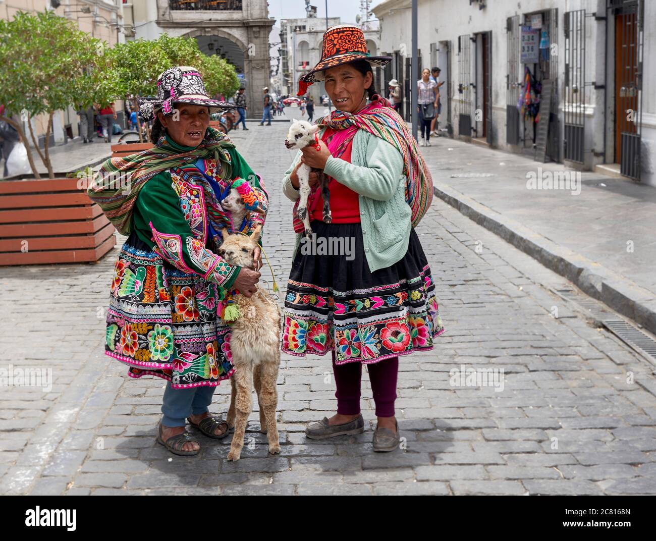 Inca ladies posing for tourist photos in Arequipa Stock Photo