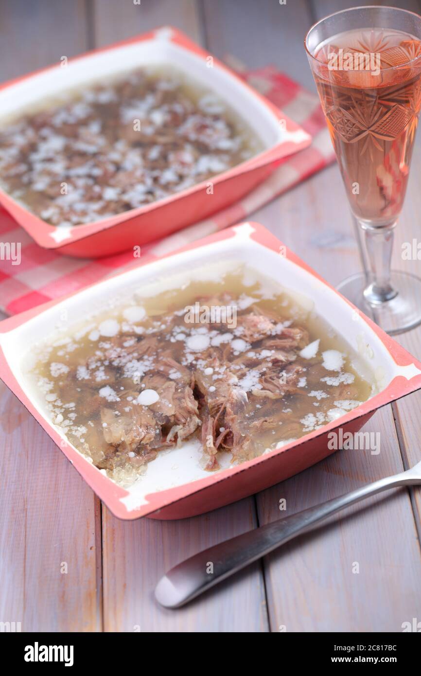 Russian kholodets, beef meat aspic on a rustic table Stock Photo