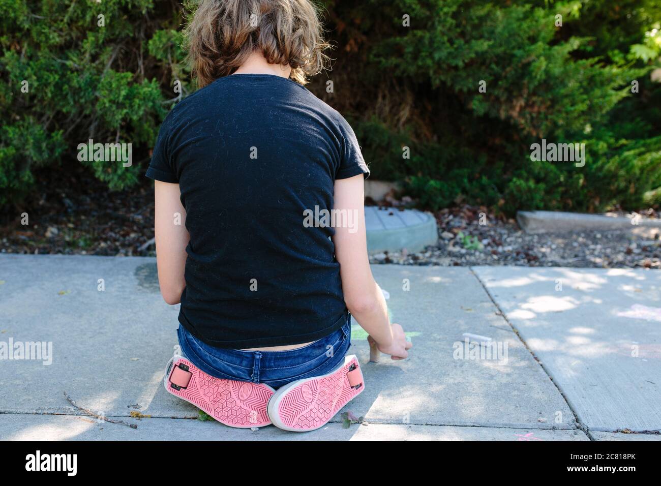 Women sitting wearing low cut trousers with underwear showing from the back  Stock Photo - Alamy