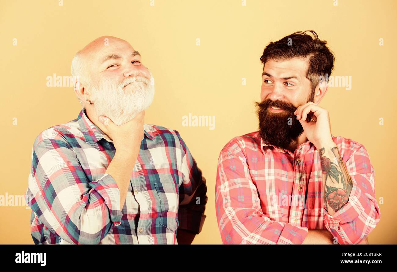 Confident and handsome. father and son family. youth vs old age compare