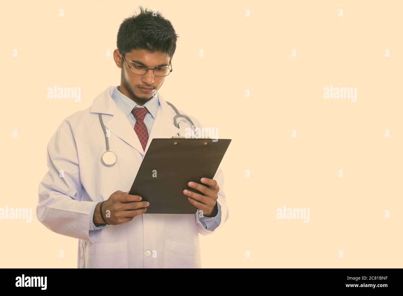 Indian doctor isolated on white hi-res stock photography and images - Alamy