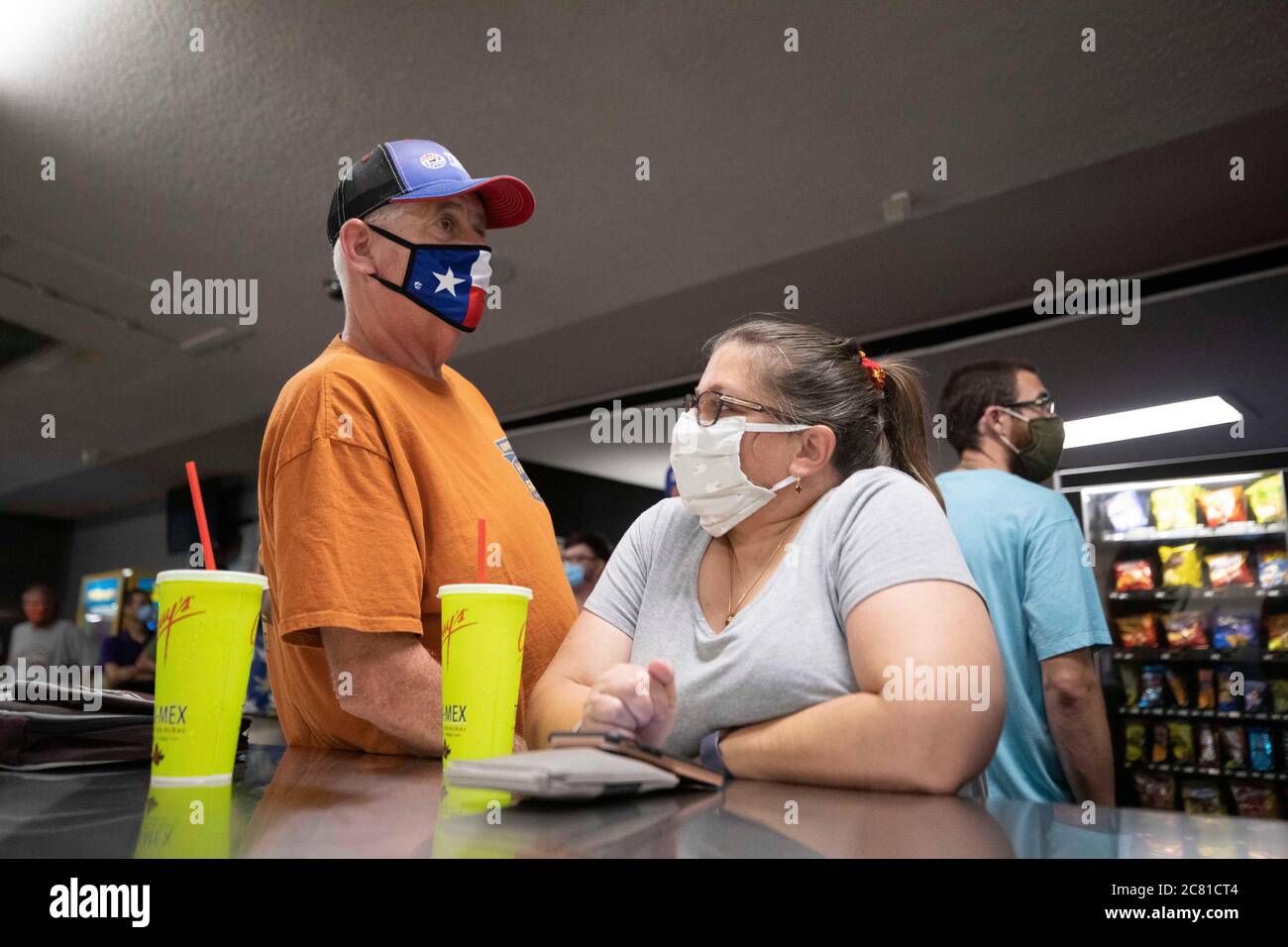 Austin, TX USA July 17, 2020: Patrons Rick and Karen Adams enjoy the last bowling night at Dart Bowl as the business, open for 64 years, closes due to economic struggles and the COVID-19 pandemic. Credit: Bob Daemmrich/Alamy Live News Stock Photo