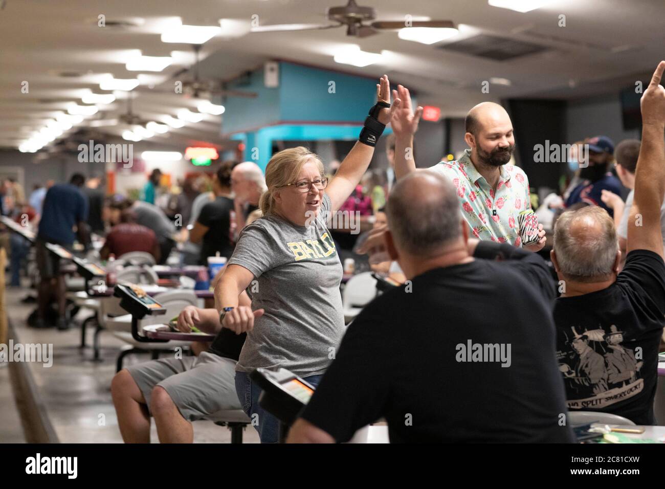 Austin, TX USA July 17, 2020: Patron Karen Klein and friends enjoy the last bowling night at Dart Bowl as the locally owned business, open for 64 years, closes due to economic struggles and the COVID-19 pandemic. Credit: Bob Daemmrich/Alamy Live News Stock Photo