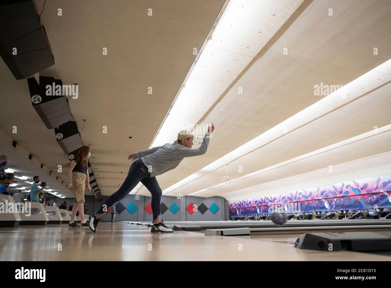 Austin, TX USA July 17, 2020: Patrons enjoy the last bowling night at Dart Bowl as the 64-year-old business in central Austin closes due to economic struggles and the COVID-19 pandemic. Credit: Bob Daemmrich/Alamy Live News Stock Photo