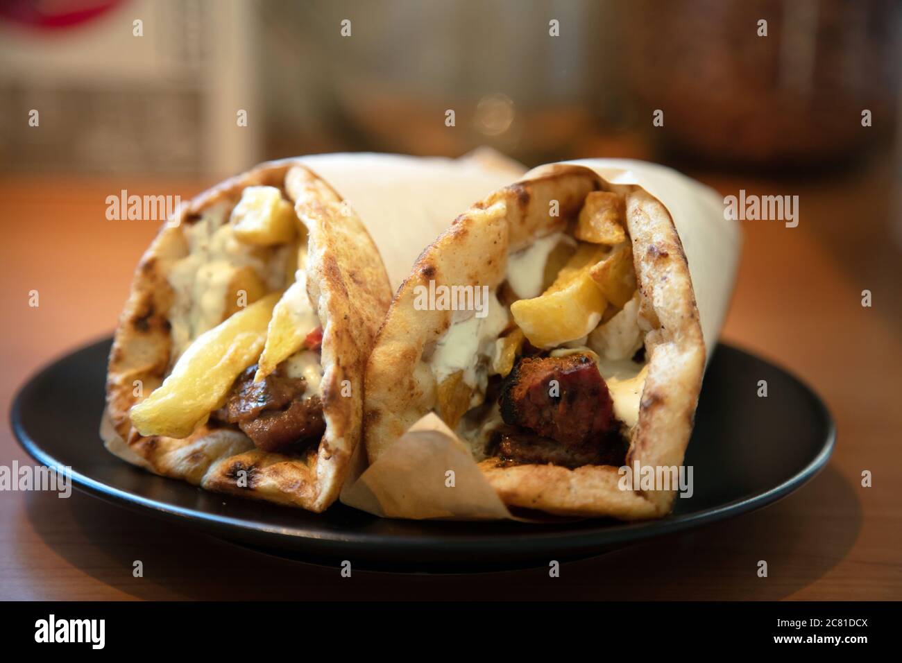 Gyro pita, shawarma, take away, street food. Two pita bread wraps with