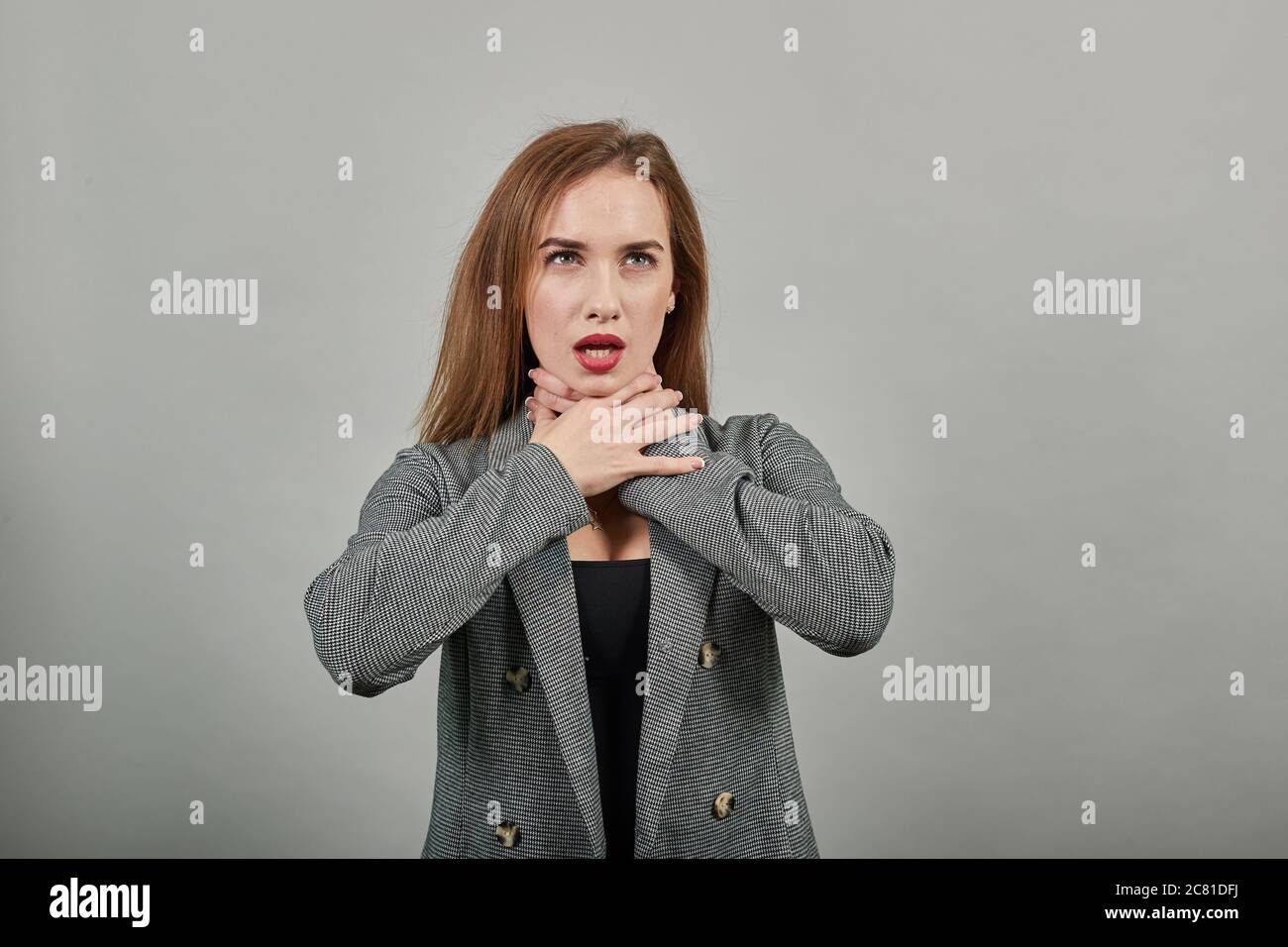 Hands around throat, screaming, panicking in trouble as chokes on food