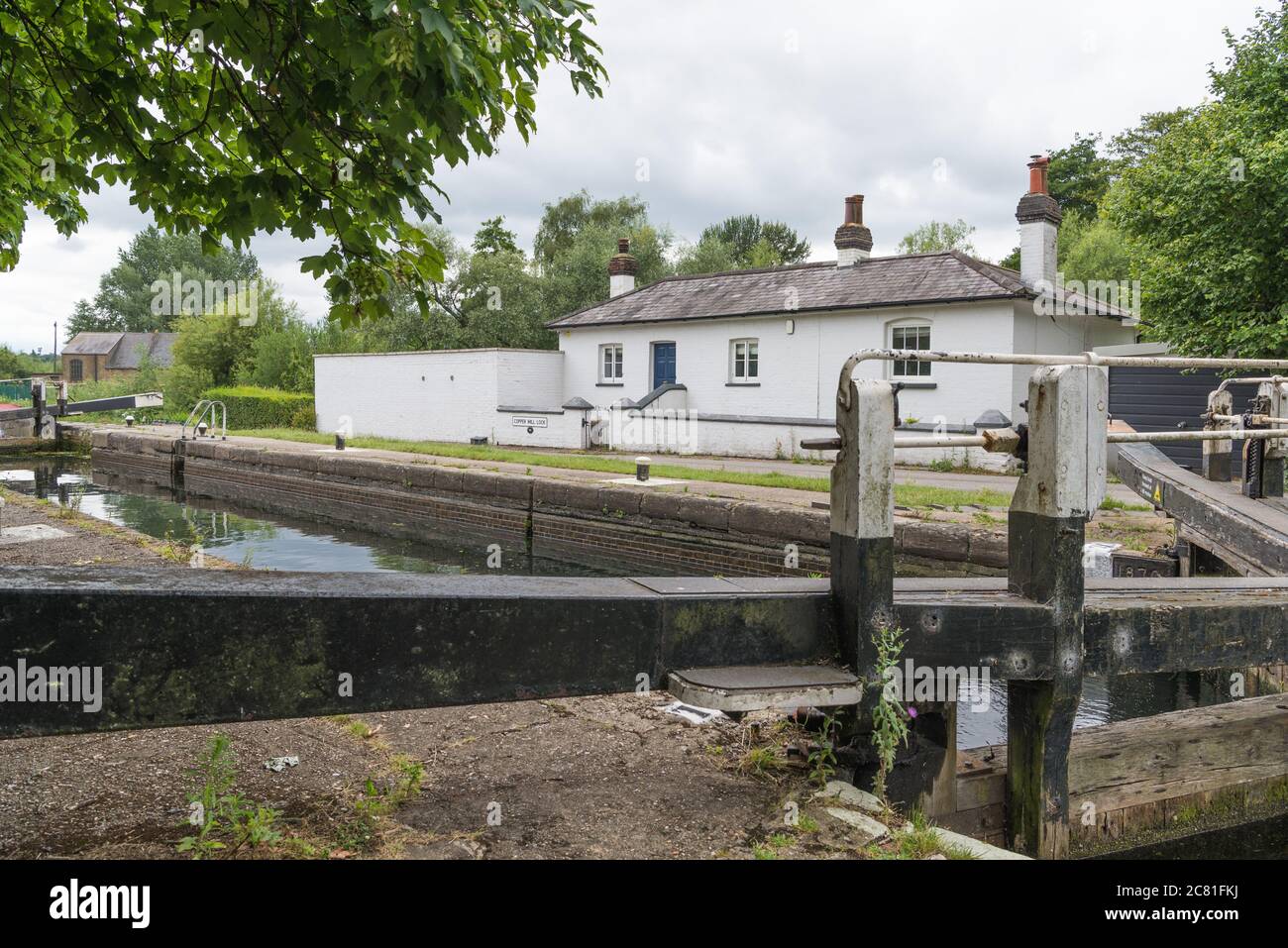 Coppermil Lock and lock keepers cottage on the Grand Union Canal, Harefield, Middlesex, England, UK Stock Photo
