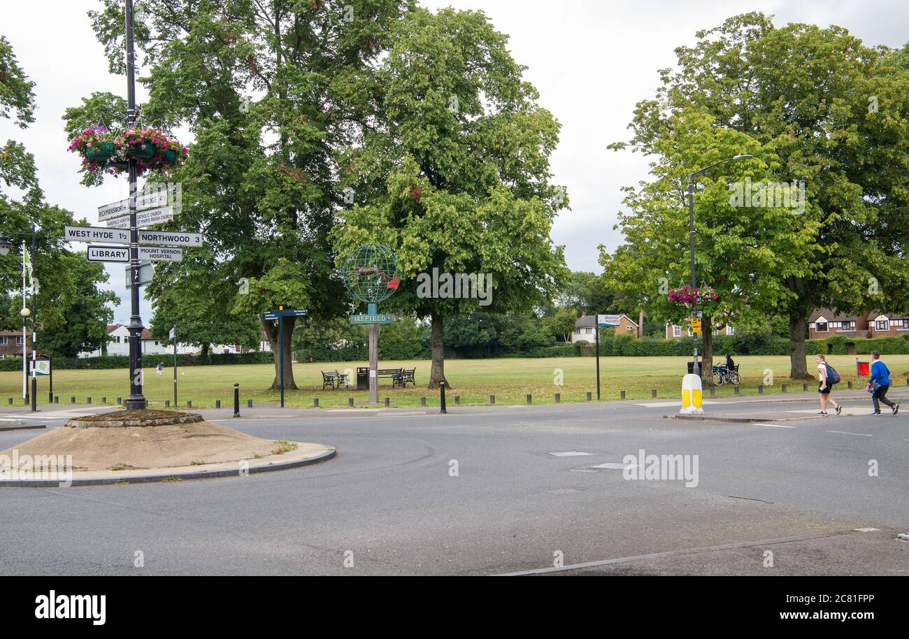 The roundabout at the junction of the High Street, Rickmansworth Road