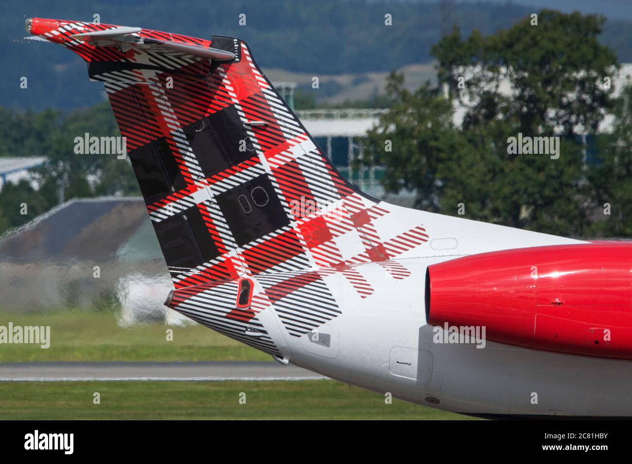 Glasgow, Scotland, UK. 20th July, 2020. Pictured: Loganair Embraer ERJ145 plane seen at Glasgow Airport. Credit: Colin Fisher/Alamy Live News Stock Photo