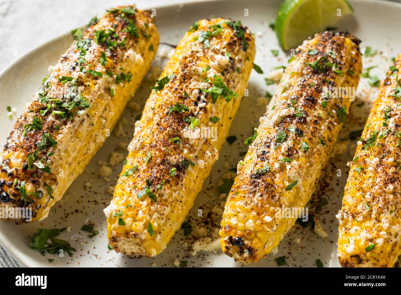 Homemade Spicy Elote Mexican Street Corn with Mayo Lime and Cheese