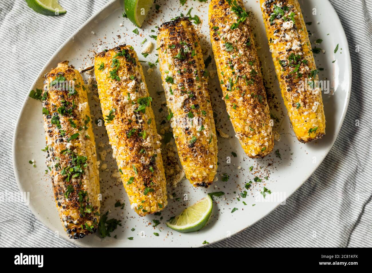 Homemade Spicy Elote Mexican Street Corn with Mayo Lime and Cheese