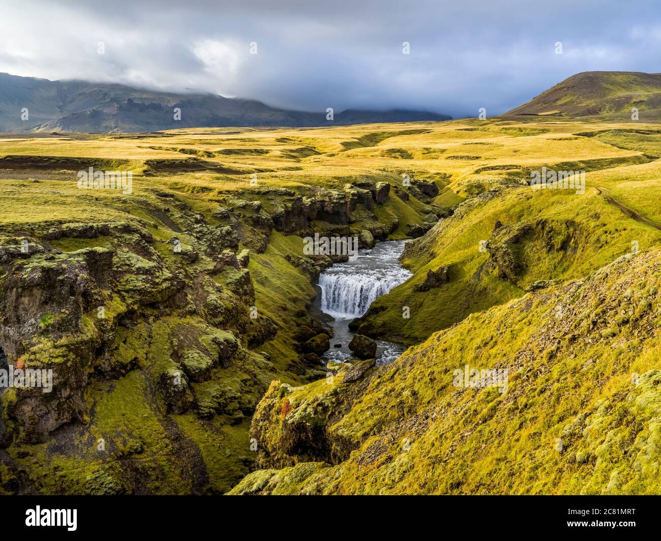 Skogafoss is one of Iceland’s biggest and most beautiful waterfalls with an astounding width of 25 meters and a drop of 60 meters Stock Photo