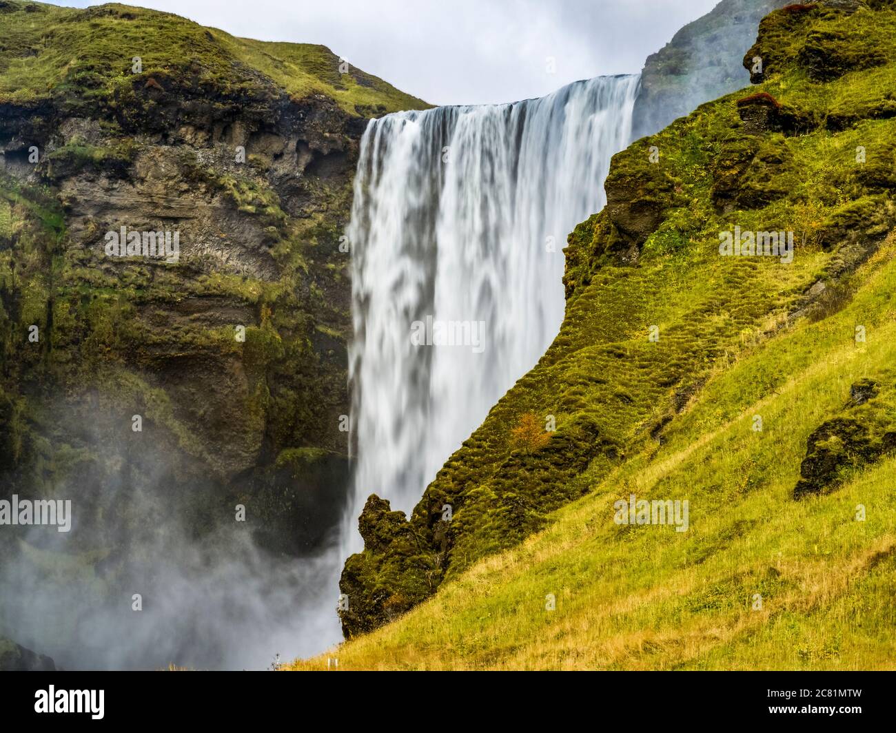 Skogafoss is one of Iceland’s biggest and most beautiful waterfalls with an astounding width of 25 meters and a drop of 60 meters Stock Photo