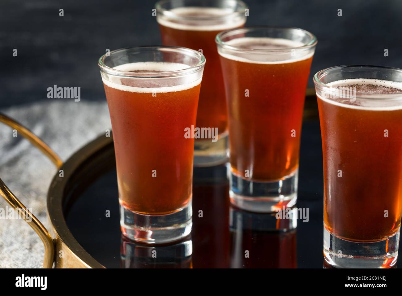Boozy Refreshing Red Headed Shots with Schnapps and Cranberry Stock Photo