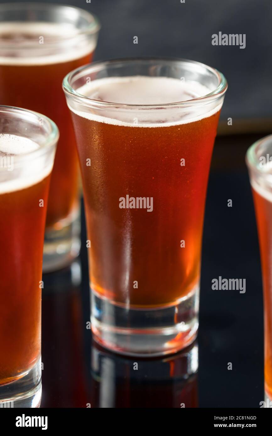 Boozy Refreshing Red Headed Shots with Schnapps and Cranberry Stock Photo