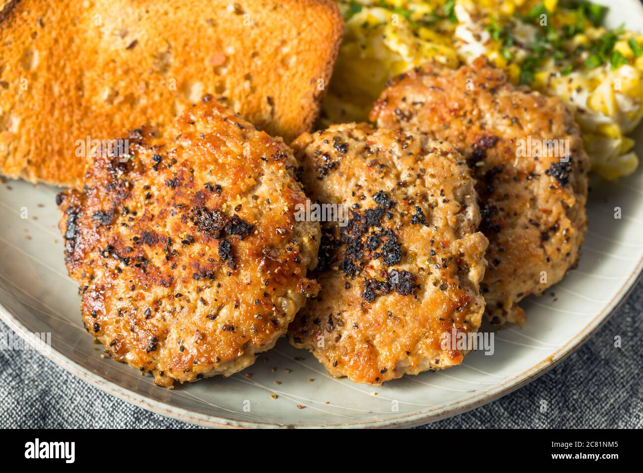 Homemade Breakfast Sausage Patty with Eggs and Toast Stock Photo Alamy