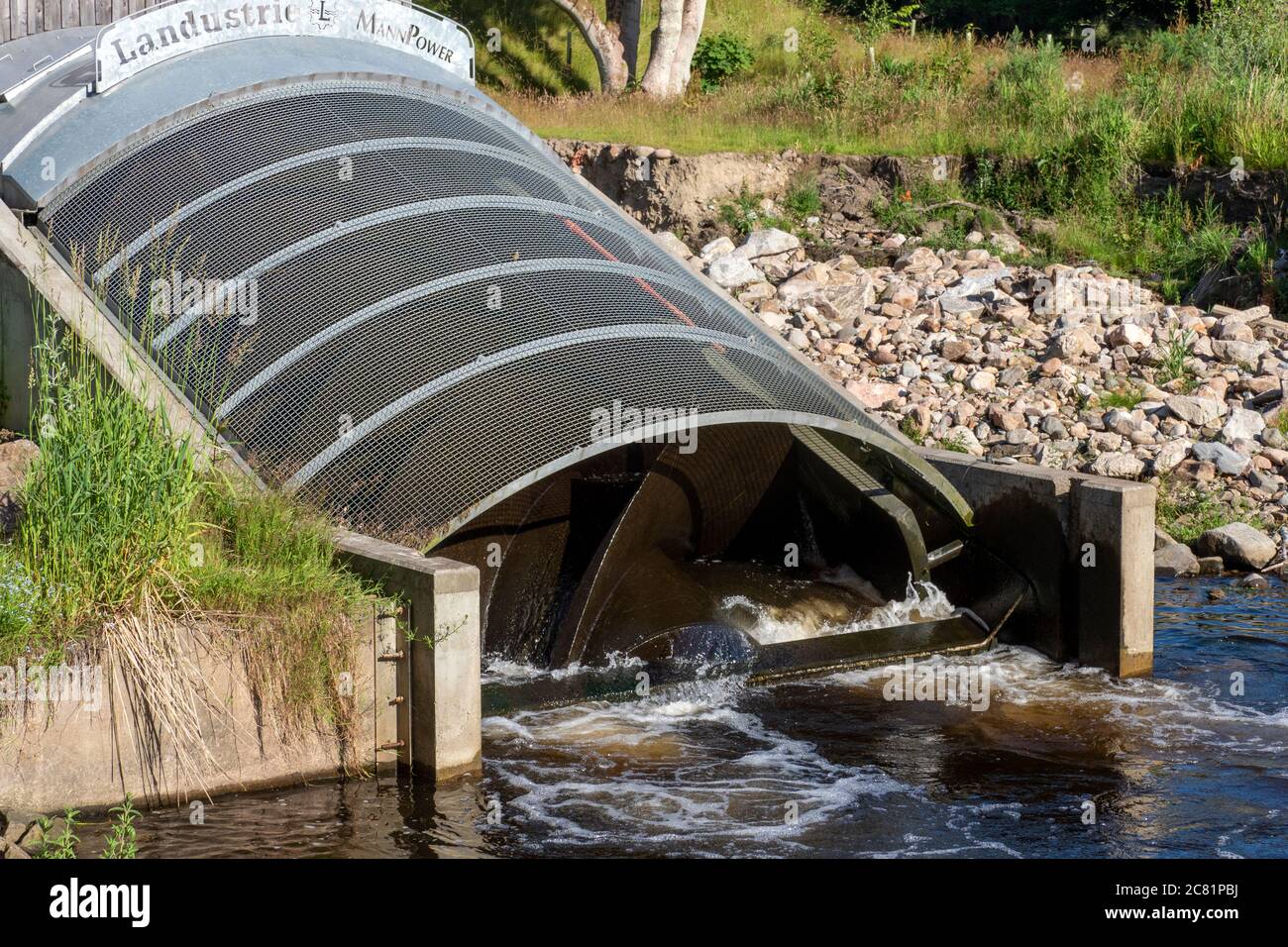 Water Turbine Electricity Generator on River Don, Scotland Stock Photo