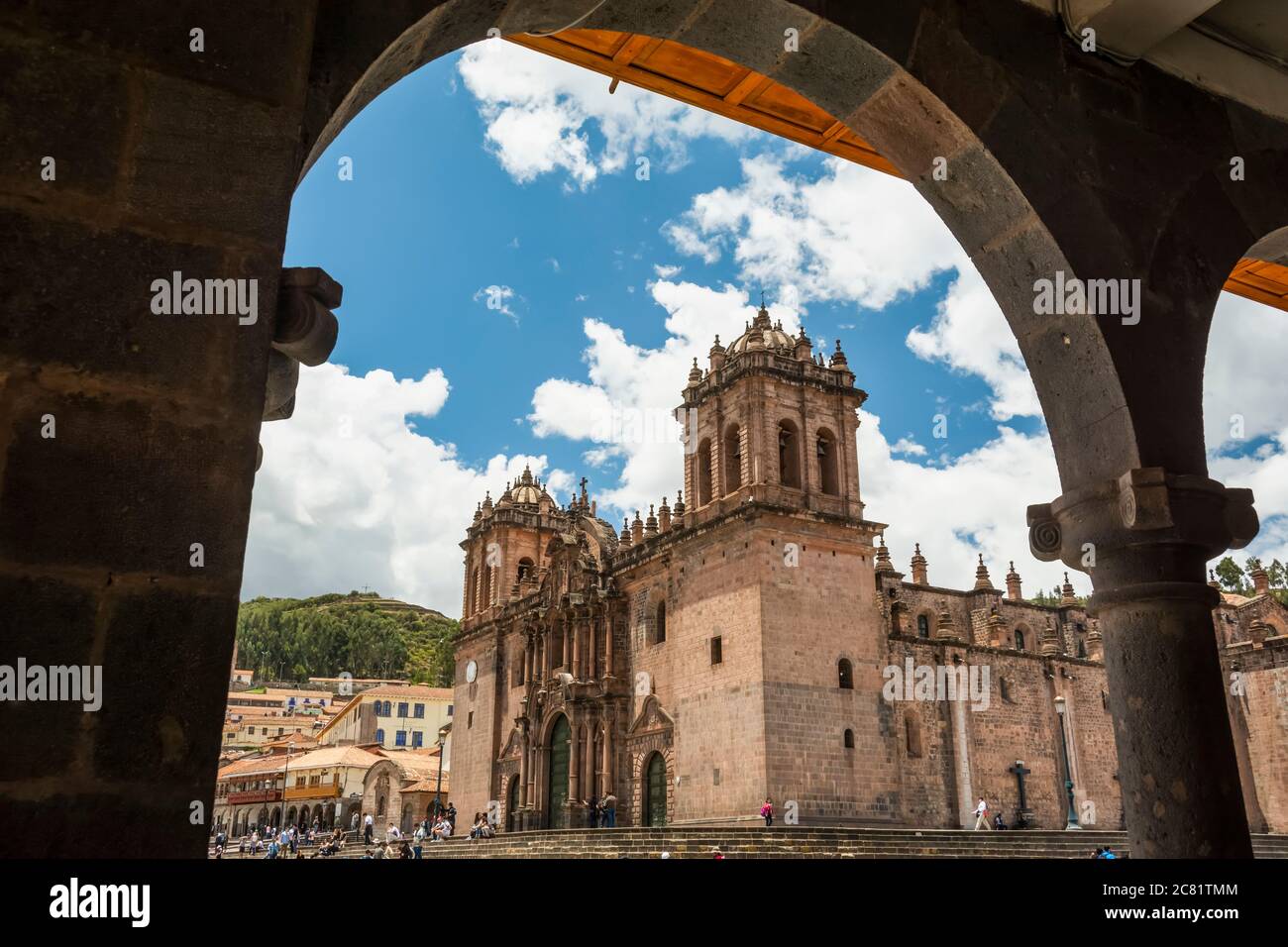 The Cusco Cathedral seen through a stone arch; Cusco, Cusco, Peru Stock Photo