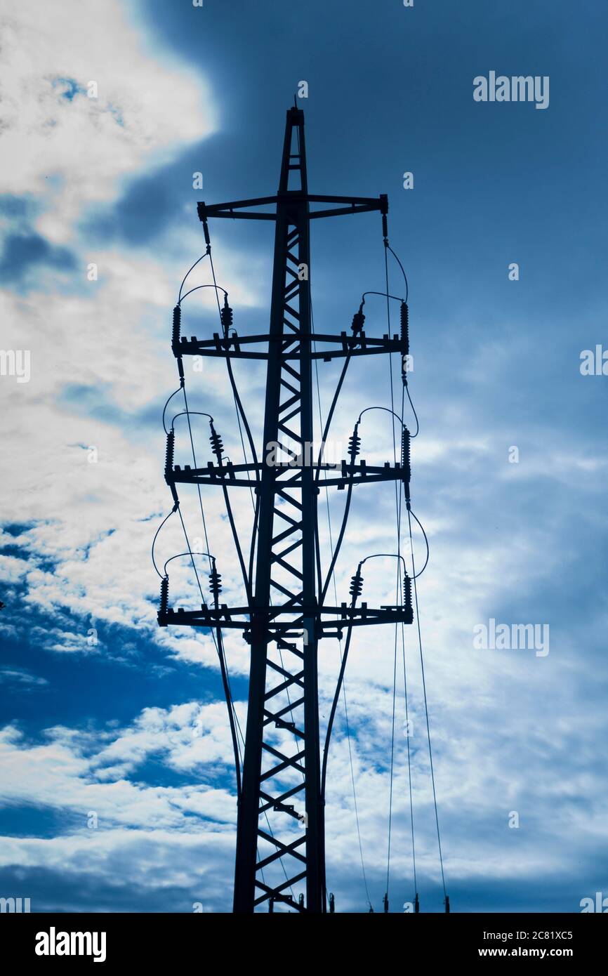 electricity power tower in silhouette Stock Photo