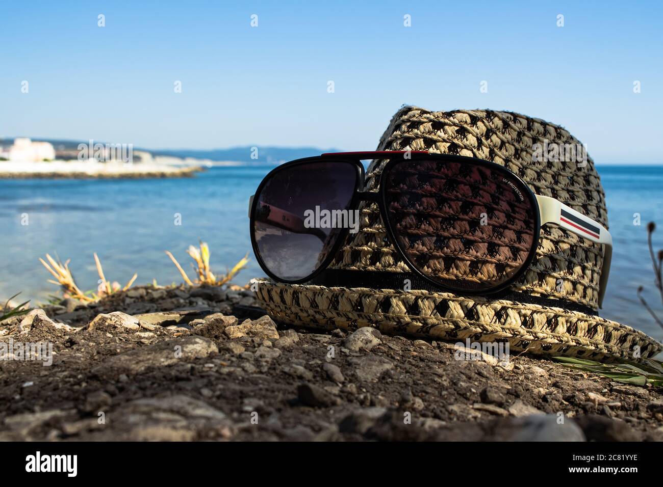 Beautiful summer vacation, beach background with a straw hat and ...