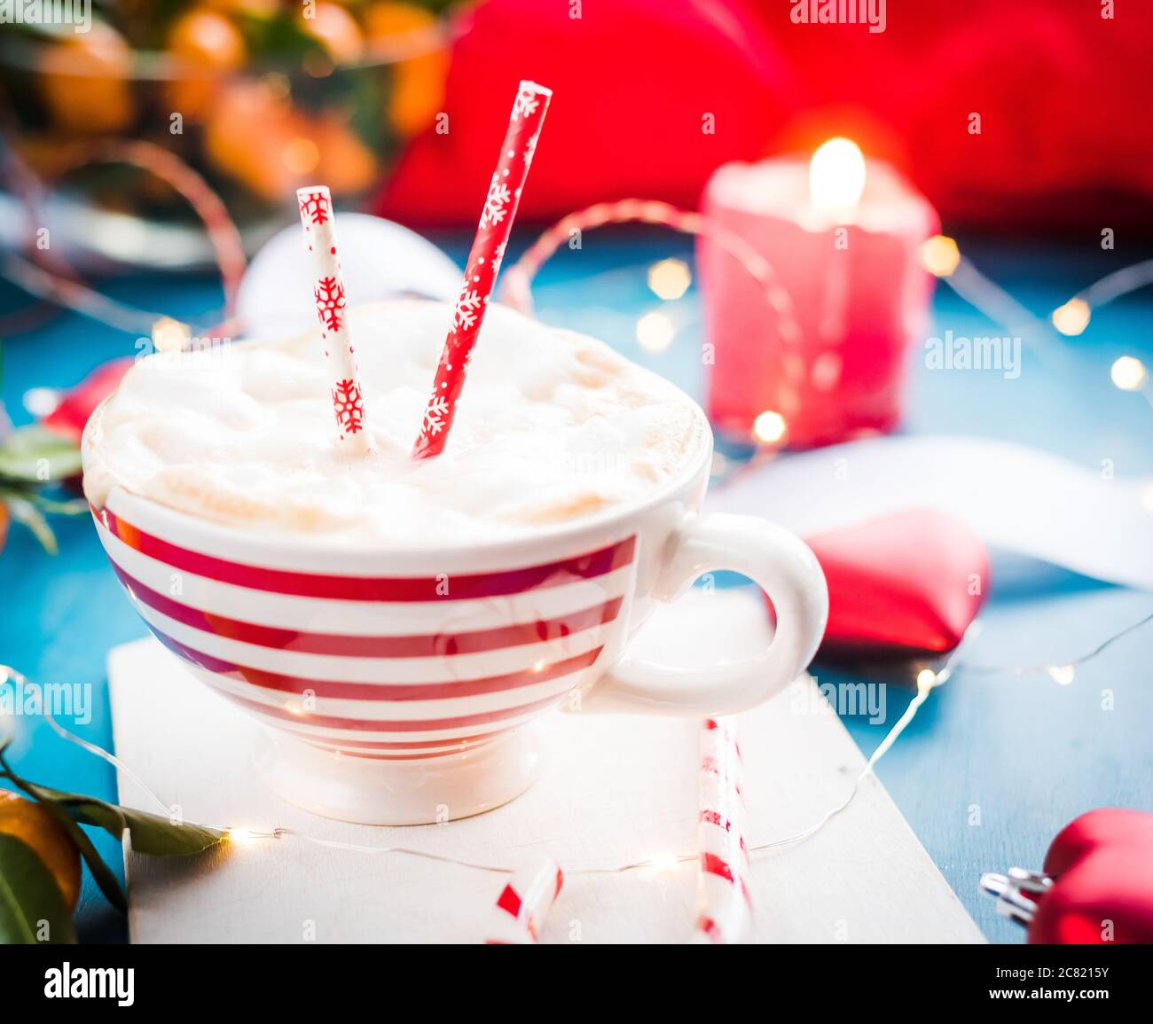 Christmas hot chocolate with marshmelow, christmas lights Stock Photo