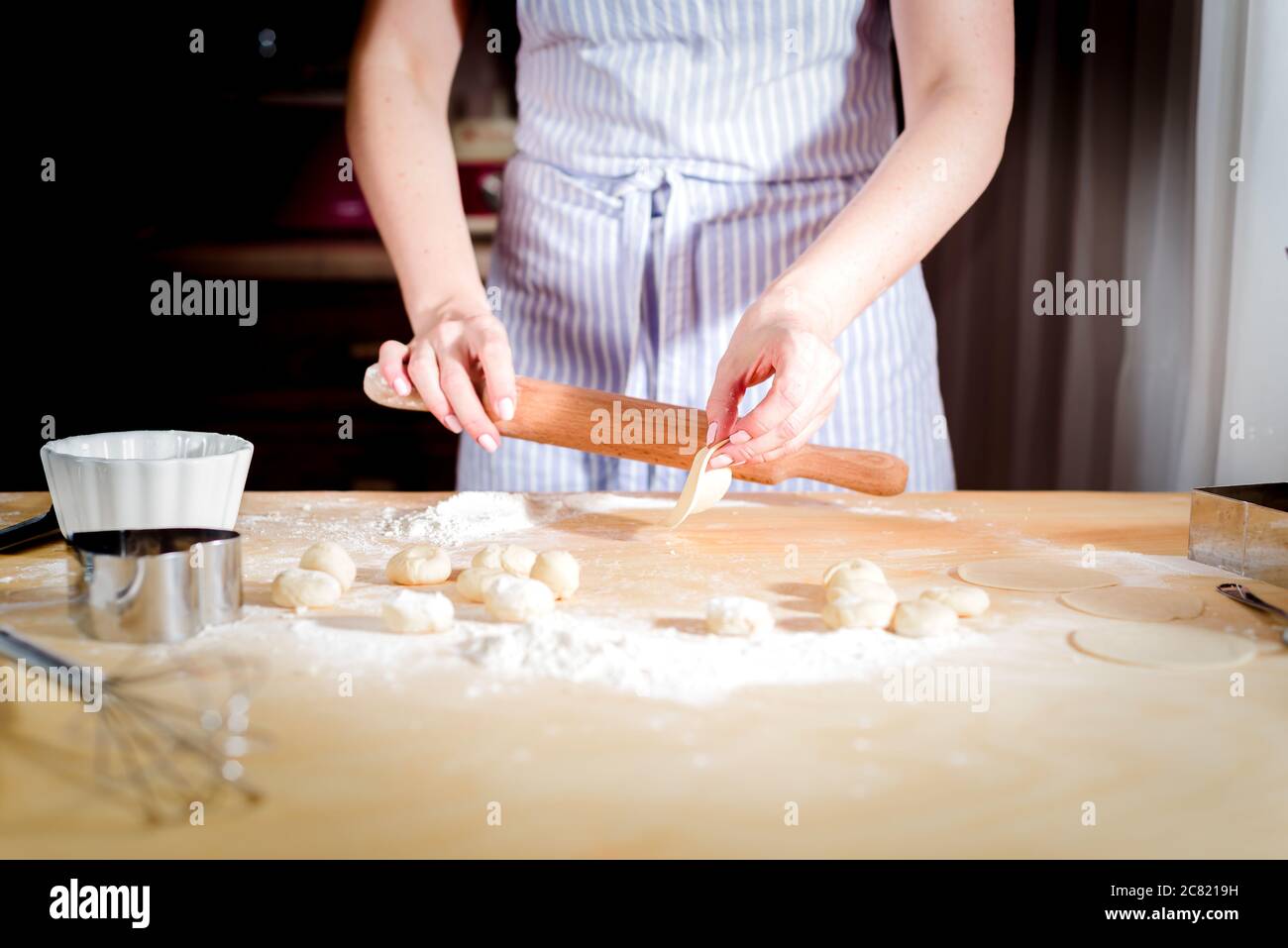 fingers on dough, chef kneads dough for baking, concept cooking, bakery Stock Photo