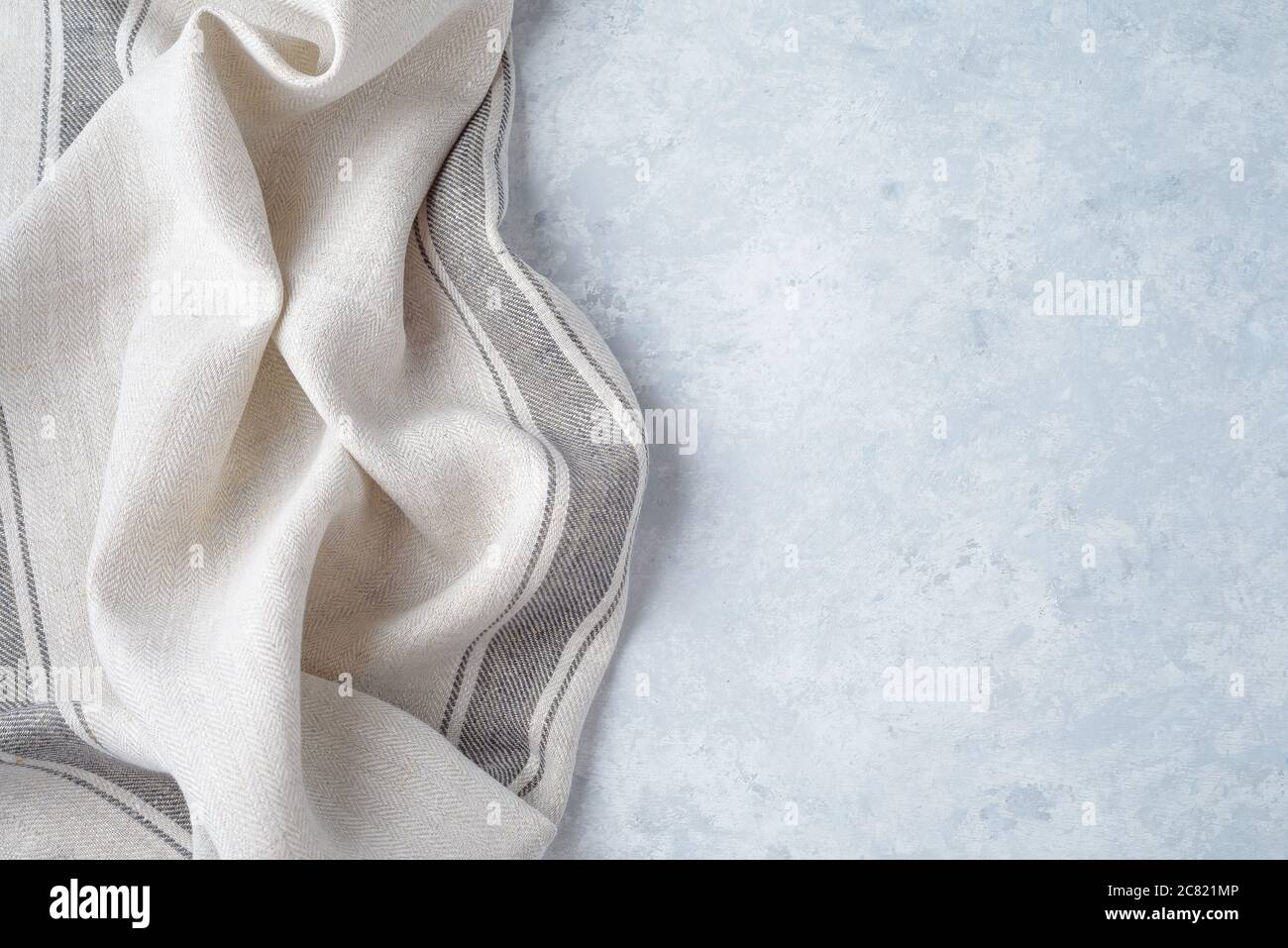 https://c8.alamy.com/comp/2C821MP/kitchen-cloth-napkin-on-wood-background-with-copy-space-2C821MP.jpg