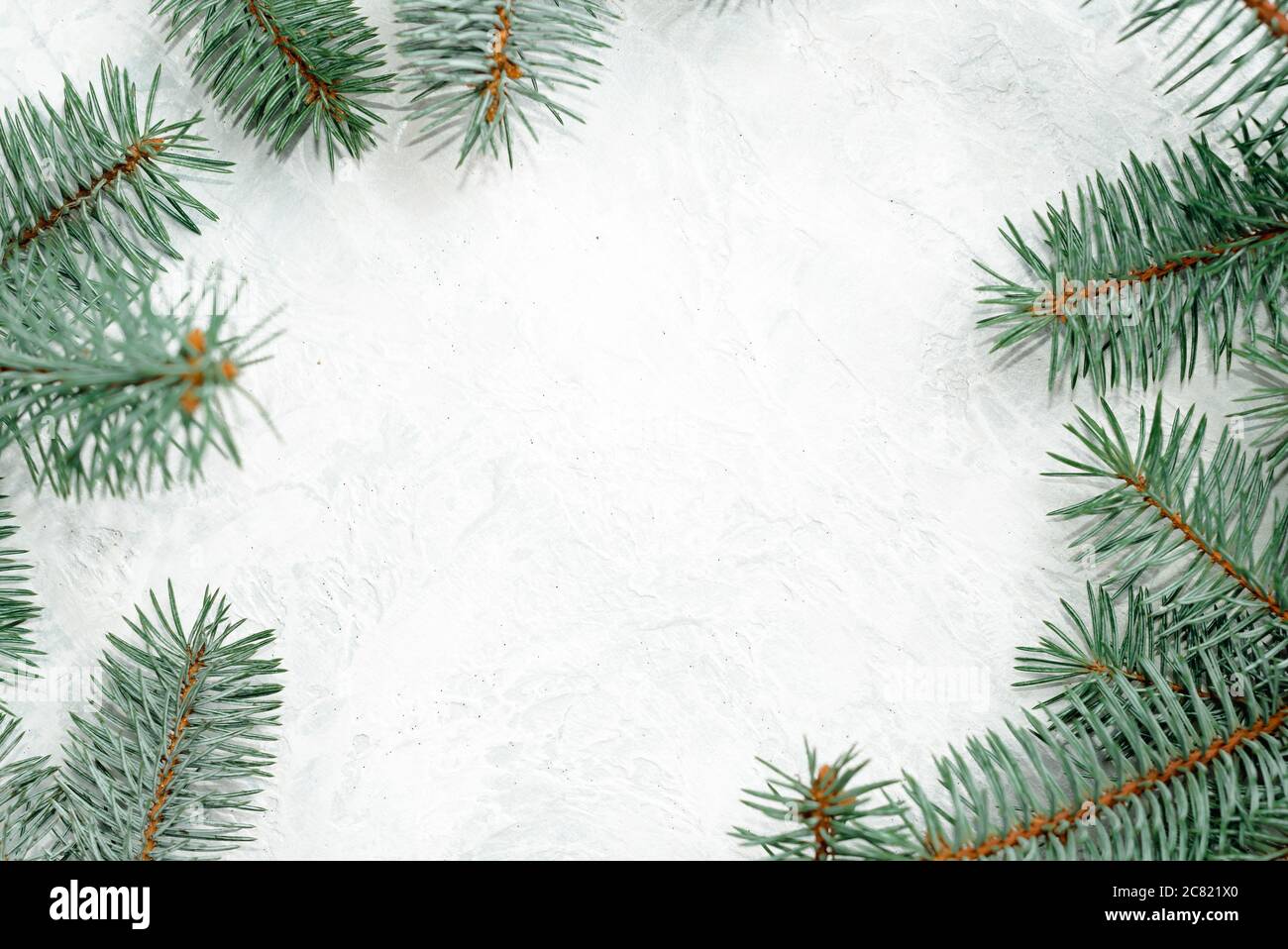 Christmas frame made of branches of a New Year tree. Christmas wallpaper.  Flat lay, top view, copy space Stock Photo - Alamy