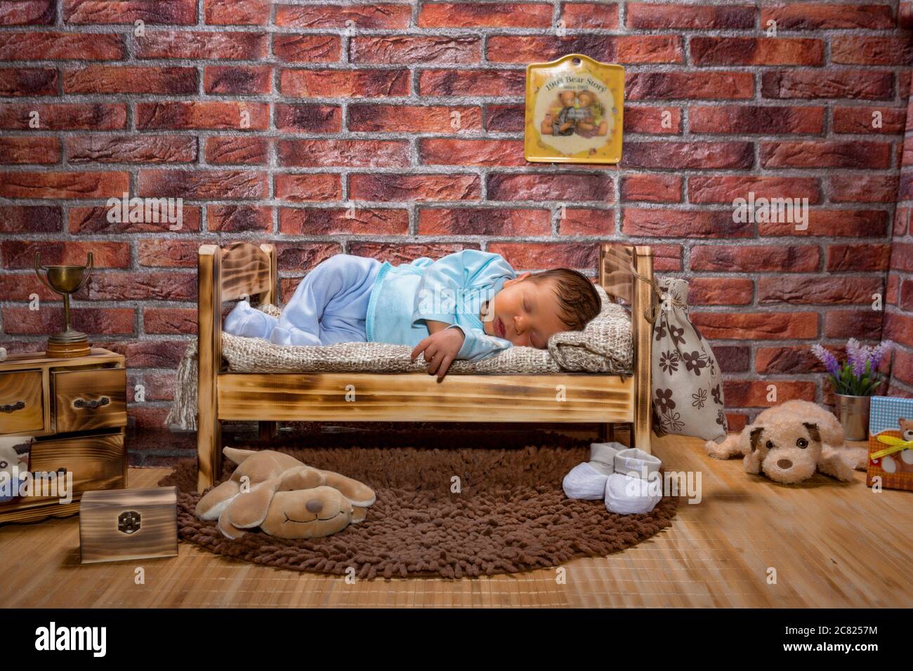 Baby sleeping in illusion room Stock Photo
